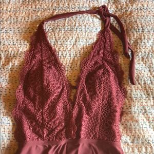 Cute lacy deep V bathing suit.